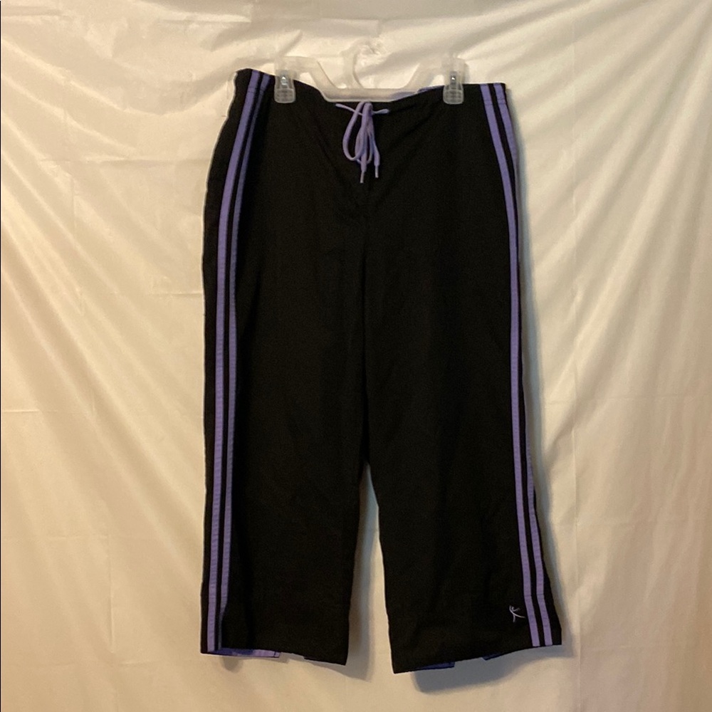 Danskin Now capris in Black with Purple Stripes. Size M 8/10
